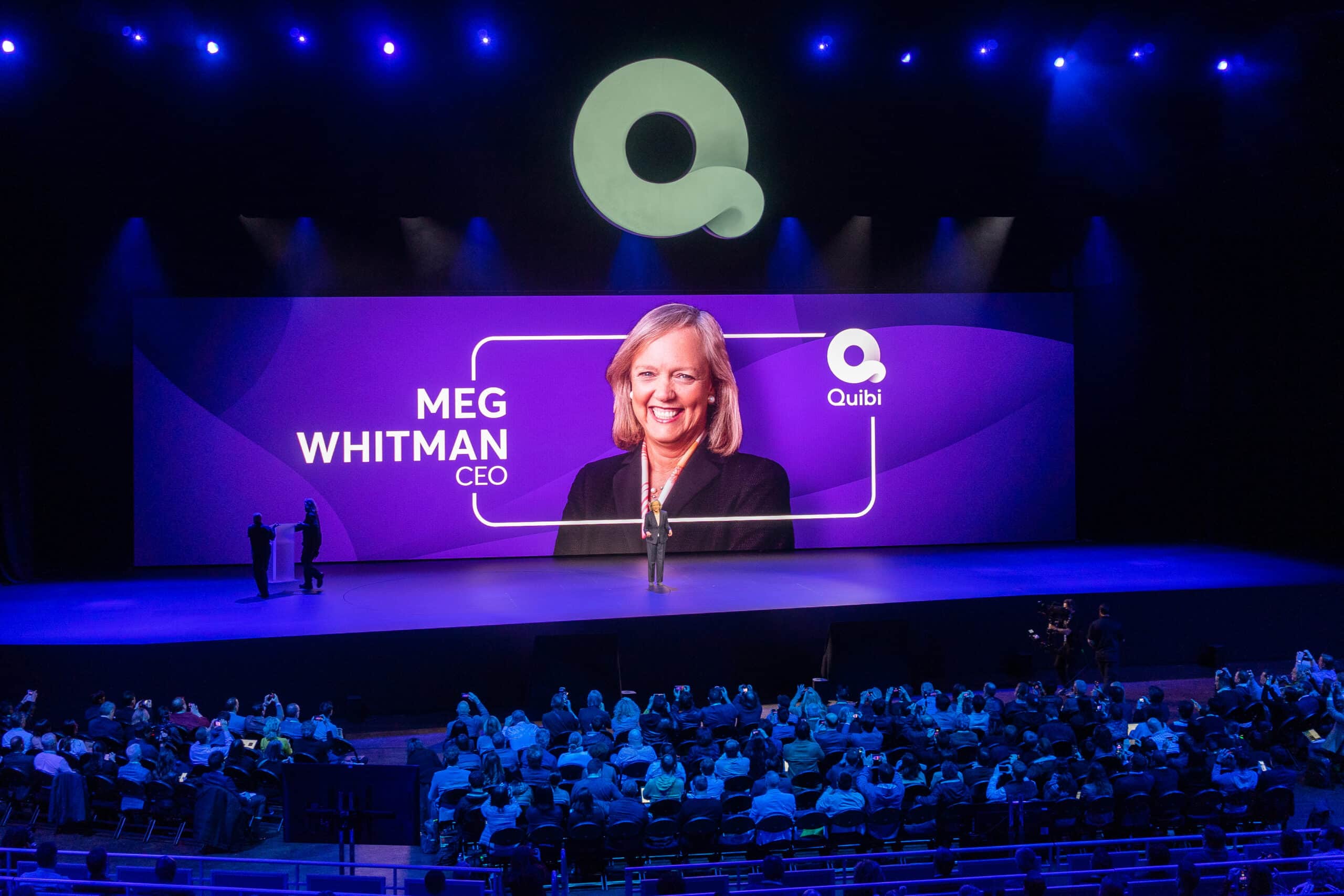 Big screen showing an image of Meg Whitman, who was pitching Quibi, at CES