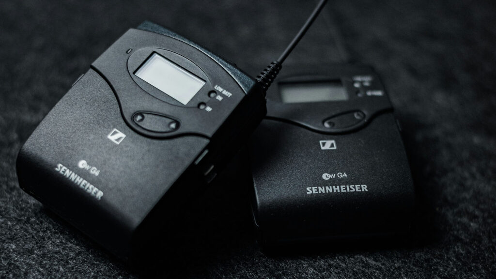 An image of Sennheiser wireless mics before the AV technician sets the RF frequency.