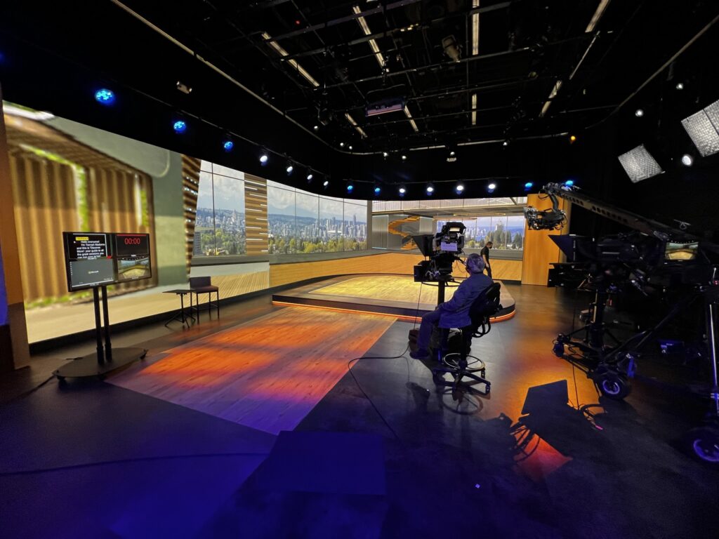 The AV production team getting ready for a rehearsal before a corporate event.